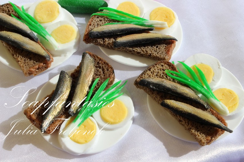 Бутер с маслом и шпротами