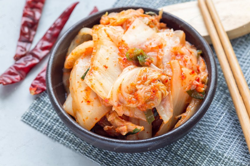 Korean Traditional fermented appetizer Kimchi Cabbage Salad in Ceramic