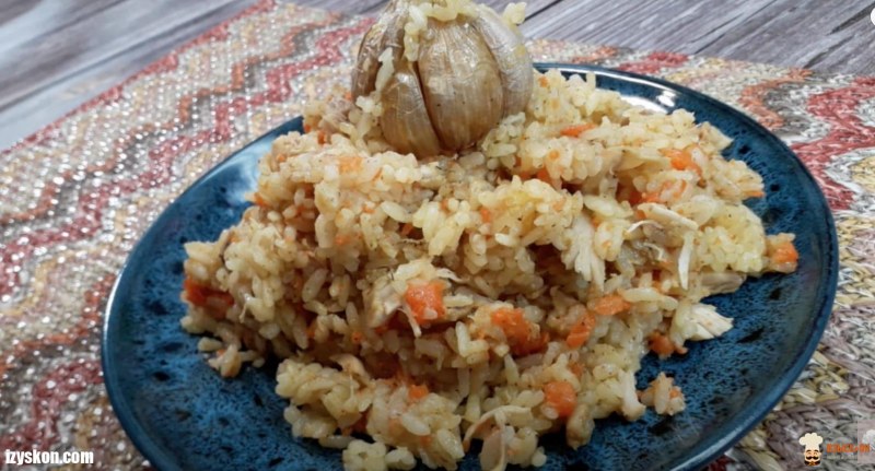 Приготовление плова в казане на костре из говядины