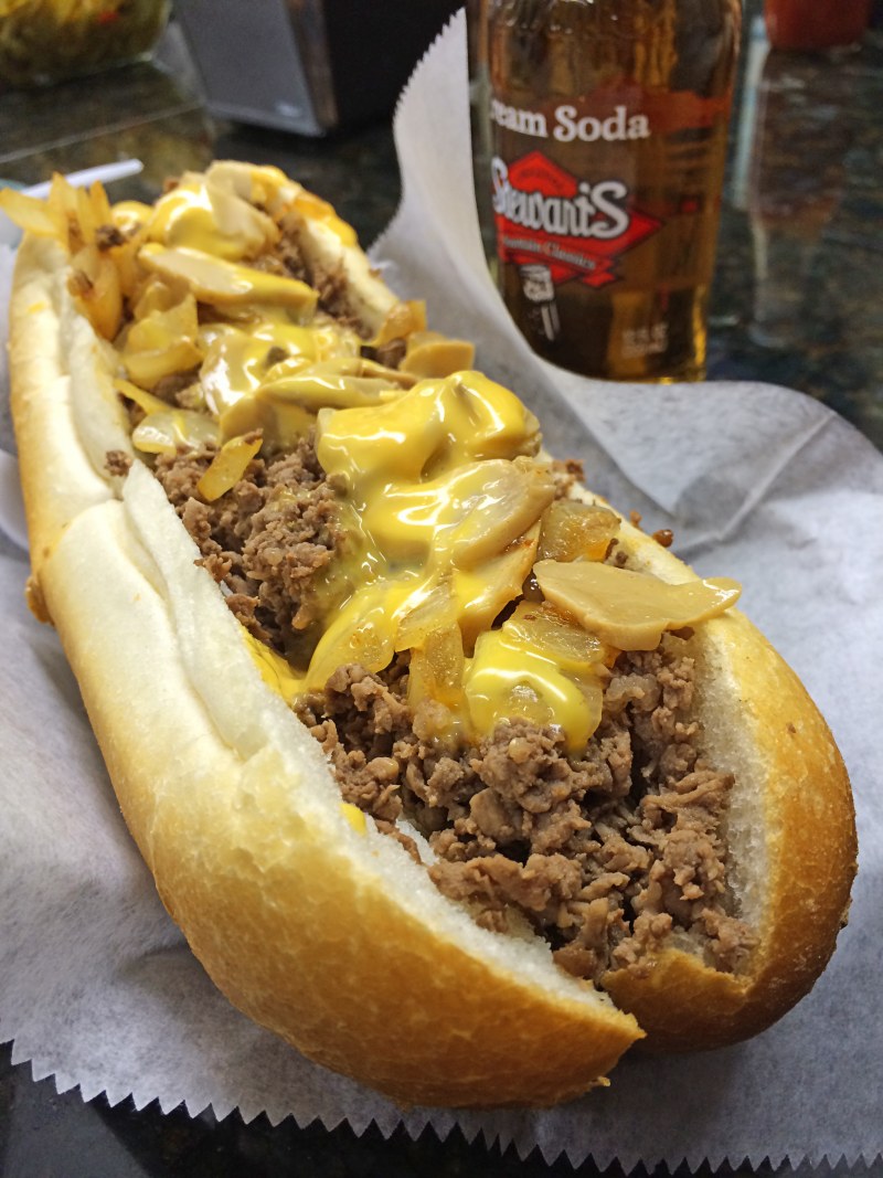 Steak Sandwich Drowned in Melted Cheese seen in Нью-Йорке. Street food of Shoreditch