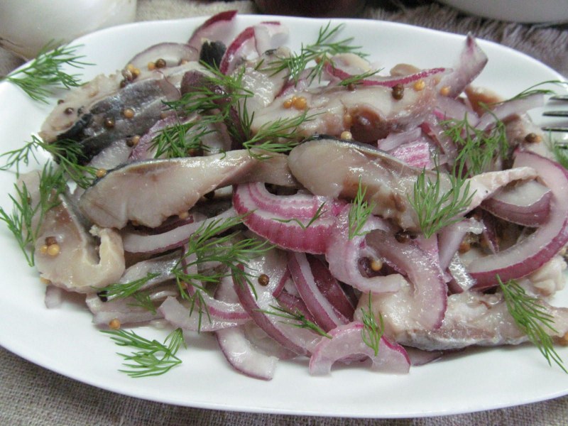 Сельдь в руке